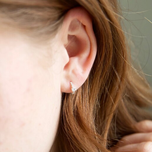 Model Wears Sterling Silver Crystal Huggie Hoop Earrings