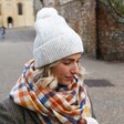 Model Wearing Natural Marled Winter Hat with Cream Pom Pom