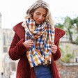 Model Wearing Lisa Angel Personalised Embroidered Blue and Yellow Check Blanket Scarf