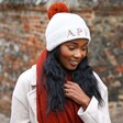 Personalised Natural Marled Winter Hat with Terracotta Pom Pom on Model