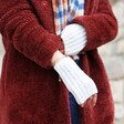 Soft Knitted Hand Warmers in Marled Cream on Model