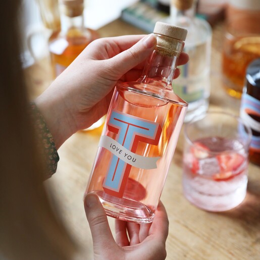 Personalised Bold Initial Banner 50cl Bottle of Pink Gin with Model
