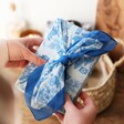 Blue and White Paisley Scarf wrapped around gift