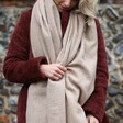 Model wearing camel toned Personalised Starry Initials Lambswool Scarf
