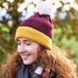 Bonnie Bobble Hat in Damson and Mustard on Model