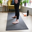 Model Using Black Personalised Embroidered Yoga Mat