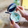 Inside Ring Rolls of Navy and Turquoise Personalised 40th Birthday Mini Round Travel Jewellery Case