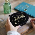 Model Holding Black Personalised Starry Night Velvet Oval Jewellery Case