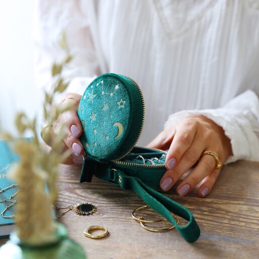 Model Holds Starry Night Velvet Mini Round Jewellery Case in Teal