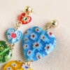 Close Up of Asymmetrical Colourful Heart Bead Drop Earrings Fastening