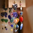 Asymmetrical Colourful Heart Bead Drop Earrings Hanging in Lisa Angel Store