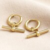Stainless Steel T-Bar Huggie Hoop Earrings in Gold on Fabric