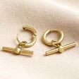 Open Stainless Steel T-Bar Huggie Hoop Earrings in Gold on Fabric