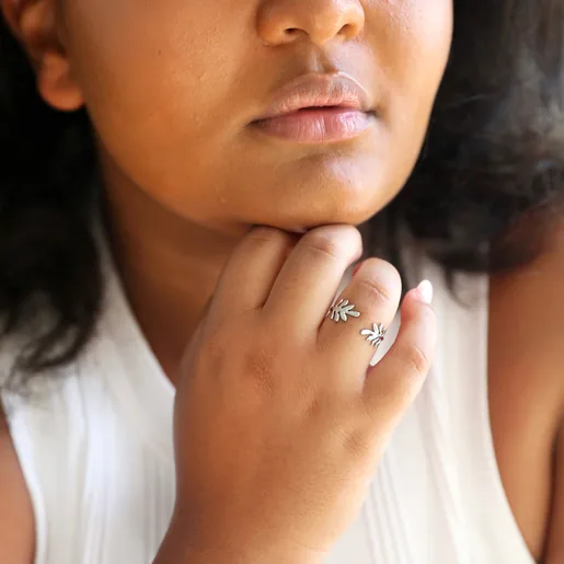 Model Wearing Adjustable Stainless Steel Fern Leaf Ring Head resting on hand