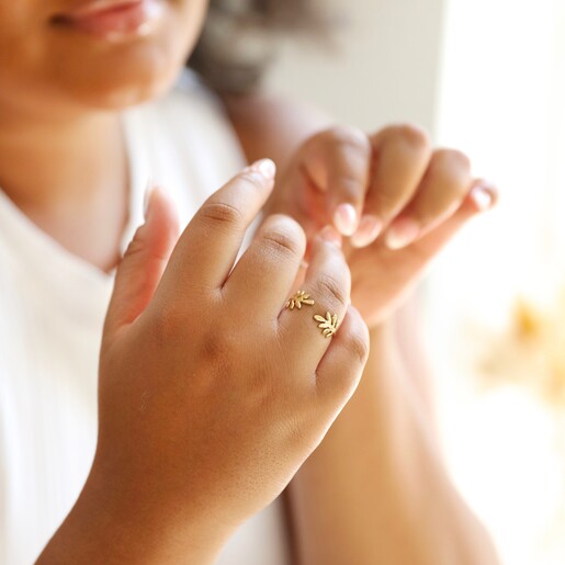 Adjustable Stainless Steel Fern Leaf Ring in Gold Worn by Model