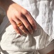 Woman Wearing Orange Dried Flower Resin Ring