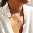 Model Wearing Organic Infinity Knot Necklace in Silver