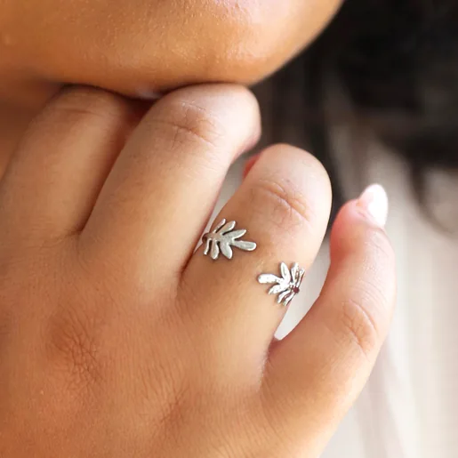 Close up of Model Wearing Adjustable Stainless Steel Fern Leaf Ring