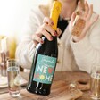 Model Holding Personalised Colourful New Home Prosecco