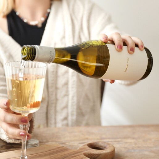Model Pouring Personalised Gold Label Bottle of Rose Wine