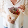Model Holding Colourful Small Bright Dried Flower Posy Bouquet