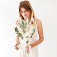Model Holding Eucalyptus and Dried Flower Wedding Bouquet