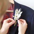UK Made White and Natural Dried Flower Buttonhole on Navy Suit