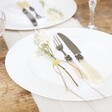White and Natural Dried Flower Table Settings for a Wedding