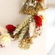 Close up of Slim Red and Green Christmas Half Wreath