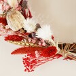 Close up of Red and Pink Dried Flower Christmas Wreath