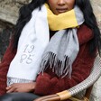 Model Wearing Personalised Year Grey and Mustard Knitted Winter Scarf