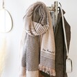 Lisa Angel Personalised Asymmetrical Striped Blanket Scarf in Beige on coat rack