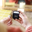 Hands Holding Black Personalised Velvet AirPods Case
