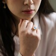 Model Wearing Adjustable Blue Chalcedony Stone Ring in Gold