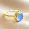 Adjustable Blue Chalcedony Stone Ring in Gold on Fabric