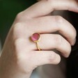 Close Up of Model Wearing Adjustable Rose Chalcedony Stone Ring in Gold