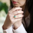 Model Wearing Adjustable Teardrop Turquoise Stone Ring in Gold