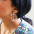Silver Laurel Leaf Face Drop Earrings on Model