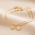 Set of 2 Daisy and Bee Chain Bracelets in Gold on Beige Coloured Fabric