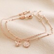 Set of 2 Daisy and Bee Chain Bracelets in Rose Gold on Beige Coloured Fabric