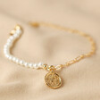 Talisman Charm Pearl and Chain Bracelet in Gold on Beige Fabric
