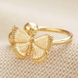 Butterfly Ear Cuff in Gold on Cream Fabric