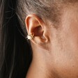 Close Up of Model Wearing Opal Sun Ear Cuff in Silver