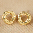 Organic Russian Ring Molten Stud Earrings in Gold on Beige Fabric
