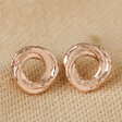 Organic Russian Ring Molten Stud Earrings in Rose Gold on Beige Fabric