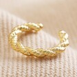 Twisted Rope Ear Cuff in Gold on Natural Coloured Fabric