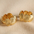 Shell Huggie Hoop Earrings in Gold on Beige Fabric