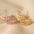 Triple Illusion Rope Hoop Earrings in Gold and Rose Gold on Fabric