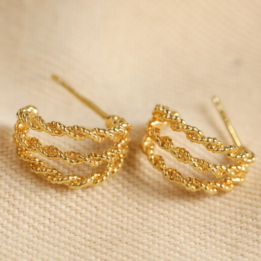 Triple Illusion Rope Hoop Earrings in Gold on Beige Fabric