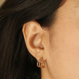 Brunette Model Wearing Triple Illusion Rope Hoop Earrings in Rose Gold